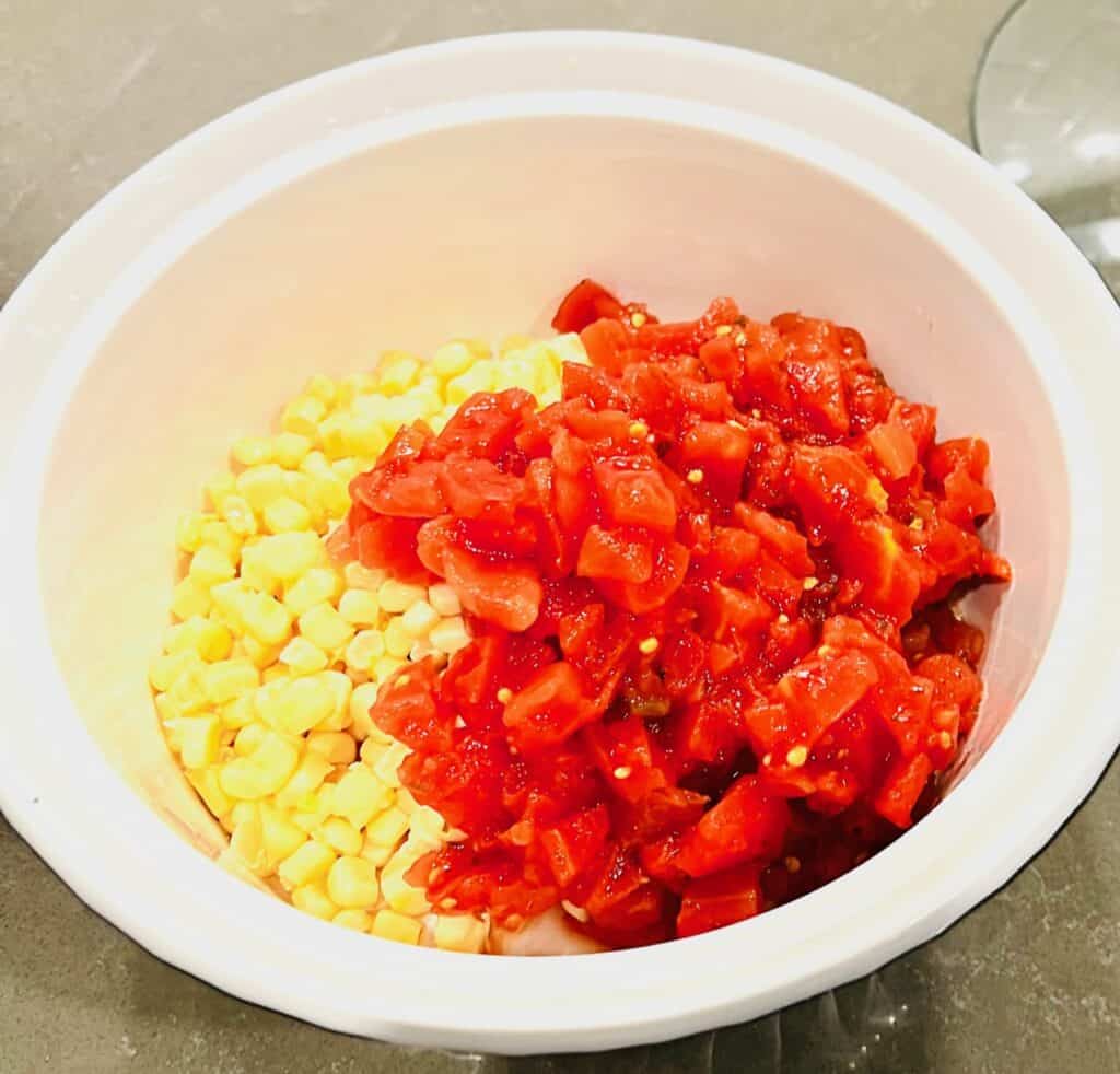 Corn and rotel in white bowl