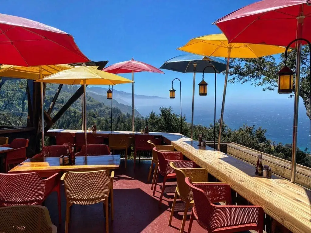 Umbrella tables at nepenthe
