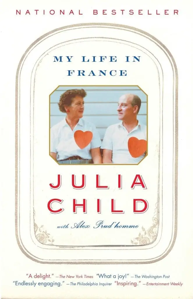 Book cover art for my life in france by julia child featuring a photo of her with her husband