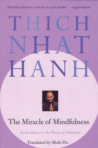 Purple book cover of thich nhat hanh the miracle of mindfulness quotes